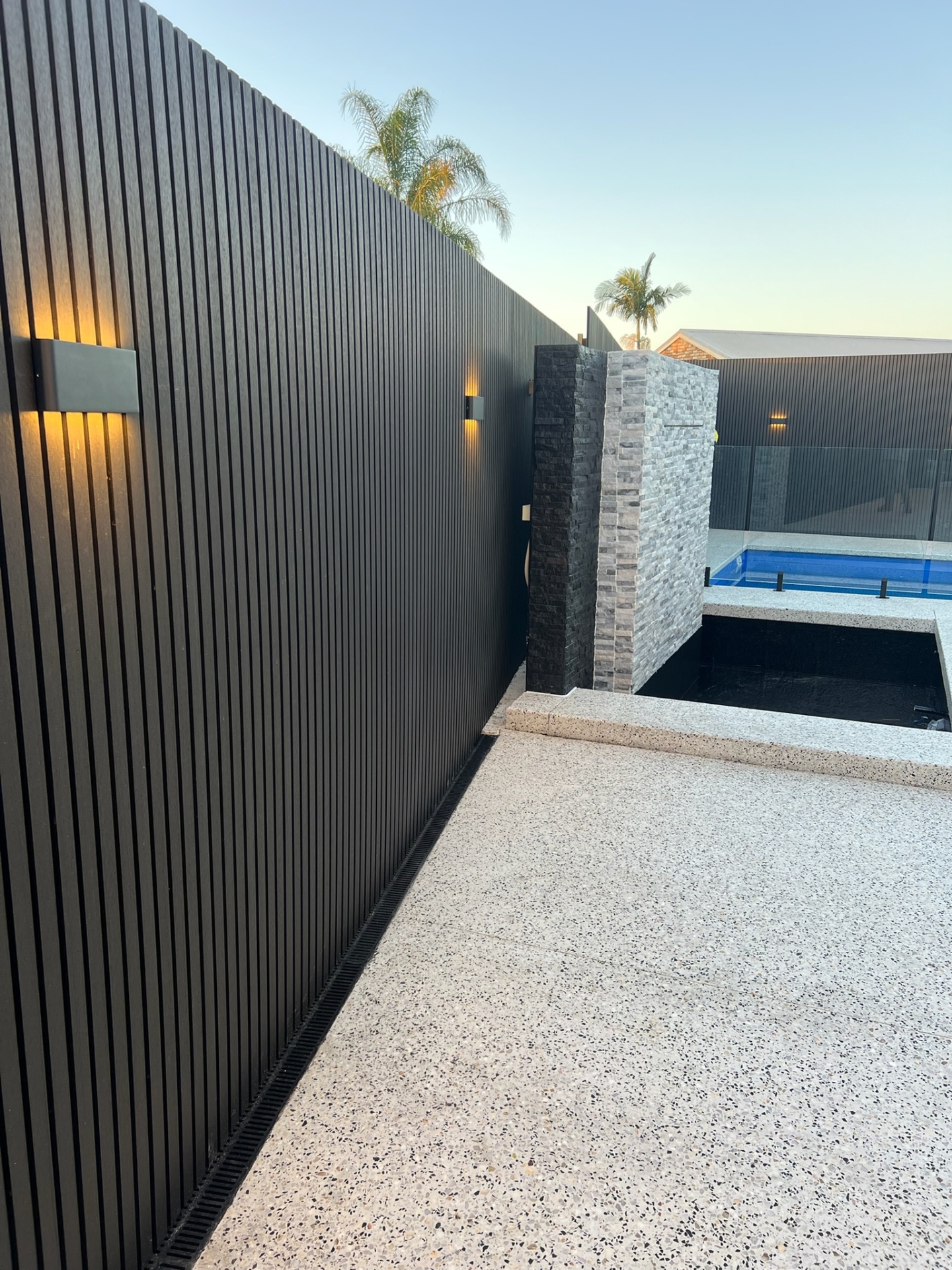 Black Cladding & Stone Feature Wall